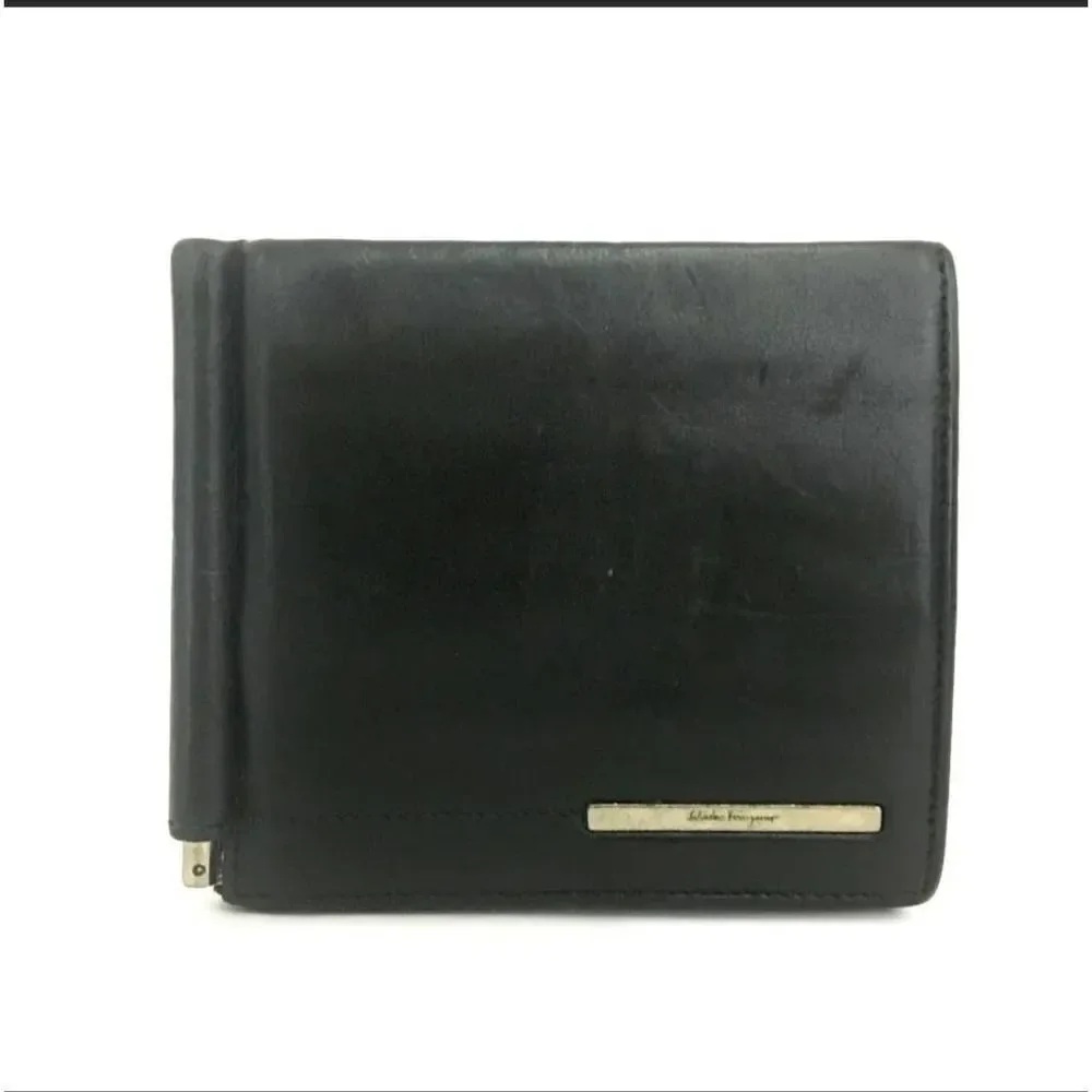 Salvatore Ferragamo Black Leather Bifold Wallet /1A7776. 668132